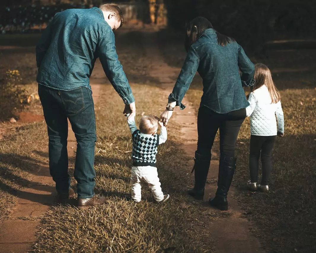 Family walking on a path